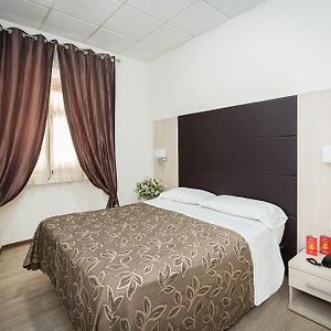 Kamer met een Queen Size Bed